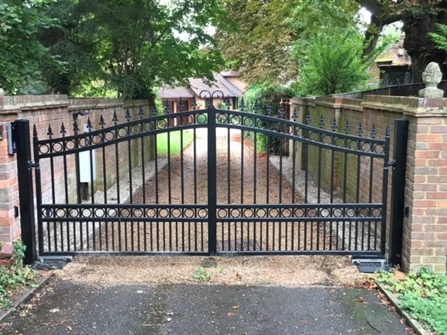 Custom black ornamental iron driveway gate